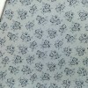 TELA DE FRANELA CON FLORES EN AZUL PALIDO