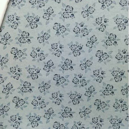 TELA DE FRANELA CON FLORES EN AZUL PALIDO