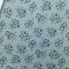 TELA DE FRANELA CON FLORES EN AZUL PALIDO