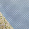 Tela de  algodón con topitos en celeste bebe