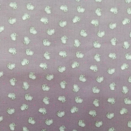 Tela de  algodón  conejitos fondo malva rosado