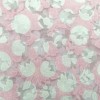 Tela devoré en tono rosa y blanco