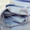 Tela de punto de sudadera celeste bebé
