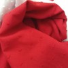 Tela de plumeti rojo